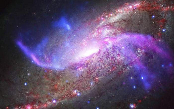 NASA公布外星系“美照”：2300万光年外的星系烟火（图）